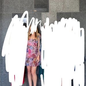 Audrey Parks/Francesca’s Colorful Floral Mini Dress